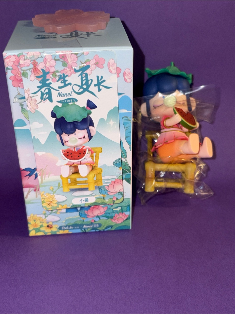 Nanci 24 solar (Lesser Heat )Figurine- Purple Hair, Pink Outfit